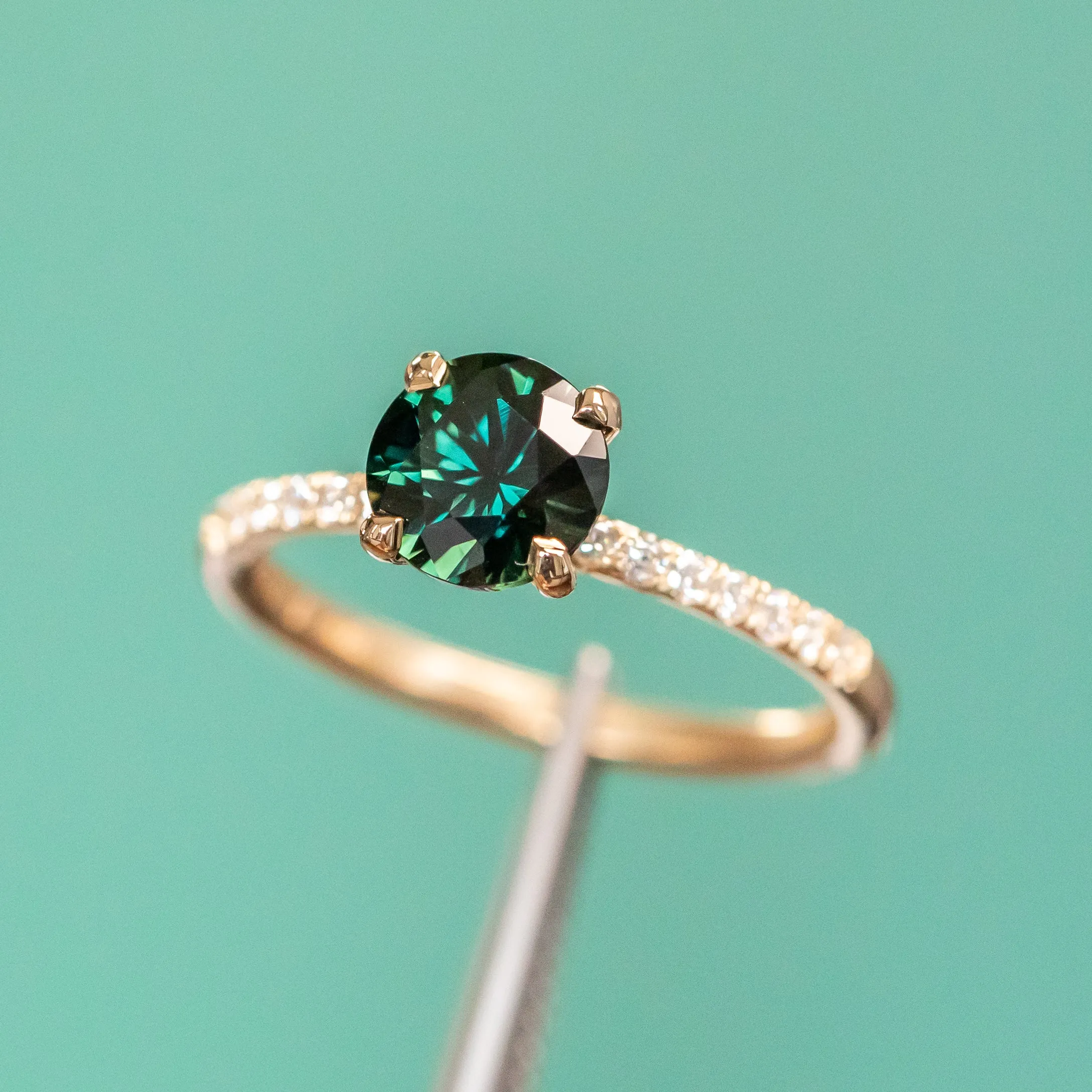 1.39ct Round Teal Green Nigerian Sapphire and French Set Diamond Solitaire in 14k Yellow Gold